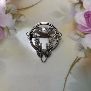 Vintage Georg Jensen sterling silver “Dove in Foliage” Brooch by Arno Malinowski
